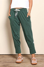 Model Pamelar wearing size 10 of the Fundamental Brunch Cotton Pant - Wintgreen in colour Wintgreen, from the front