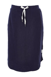 Product shot of the Fundamental Isla Skirt in colour Navy (Blue), from the front