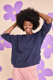 Model Aiyana wearing size 10 of the Fundamental Mazie Cotton Sweat Top in colour Navy (Blue), from the front, showing the whole outfit