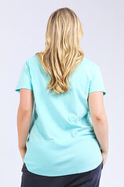 A model wearing the Fundamental Rib Short Sleeve Cotton Tee in colour Tonicblue (Blue), from the back