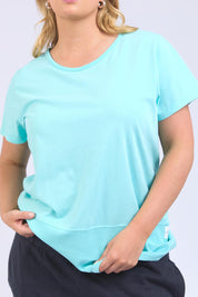 A model wearing the Fundamental Rib Short Sleeve Cotton Tee in colour Tonicblue (Blue), from the front, cropped image