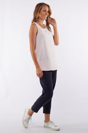 A model wearing the Fundamental Rib Cotton Tank in colour Pink (Pink), from the front, showing the whole outfit