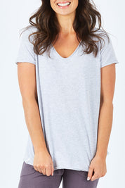 Model Shadae wearing size 10 of the Fundamental Vee Cotton Tee in colour GreyMarle (Grey), from the front, cropped image
