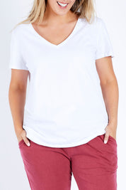 Model Jess wearing size 14 of the Fundamental Vee Cotton Tee in colour White (White), from the front, cropped image