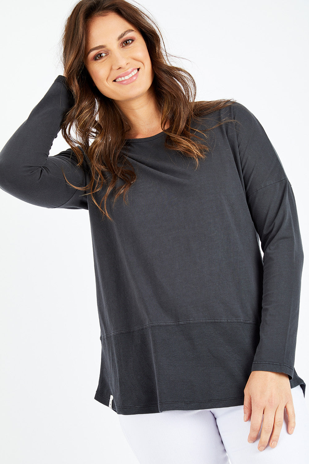 Model Shadae wearing size 10 of the Fundamental Rib Long Sleeve Tee in colour Black (Black), from the front, cropped image