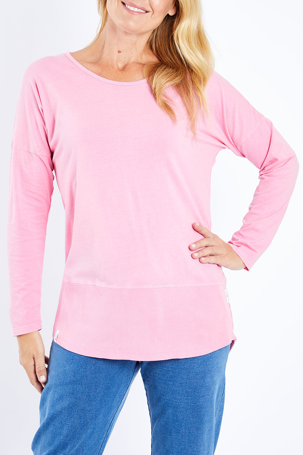Model Bianca wearing size 10 of the Fundamental Rib Long Sleeve Tee in colour Bubblegum (Pink), from the front, cropped image