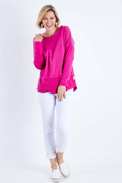 Model Veronica wearing size 10 of the Fundamental Rib Long Sleeve Tee in colour Fuchsia (Pink), from the front, showing the whole outfit