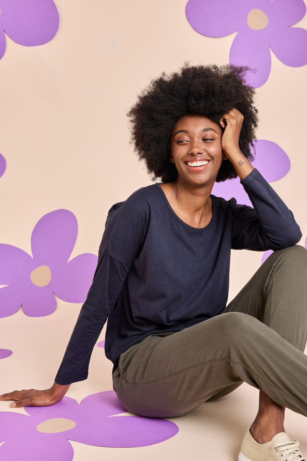 Model Aiyana wearing size 10 of the Fundamental Rib Long Sleeve Tee in colour Navy (Blue), from the front, showing the whole outfit
