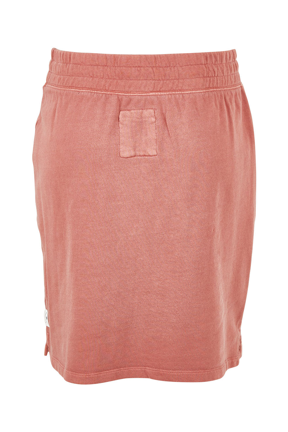 Product shot of the Fundamental Cassie Skirt in colour Clay (Pink), from the back