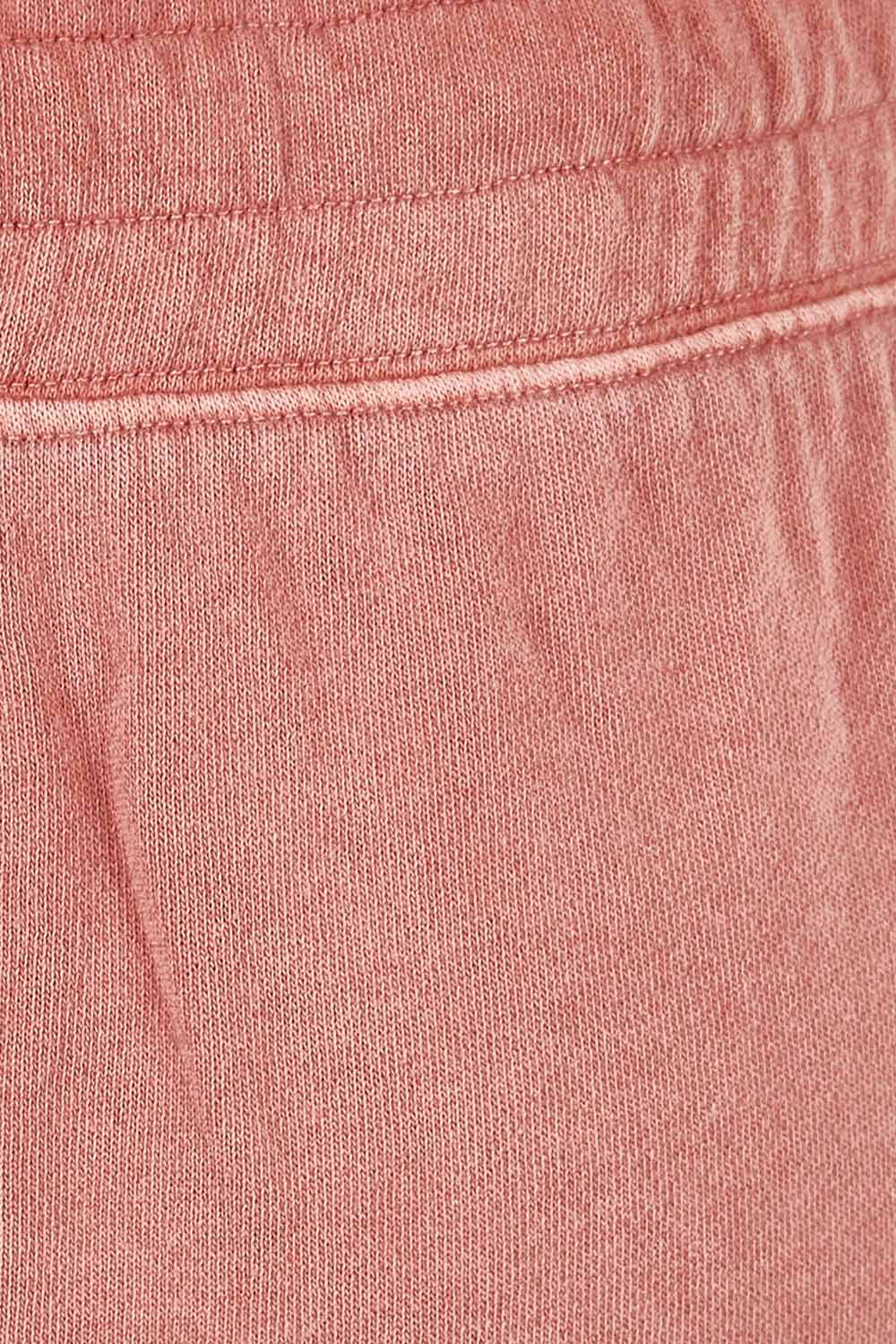 Product shot of the Fundamental Cassie Skirt in colour Clay (Pink), detail