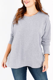 Model Jessica wearing size 14 of the Fundamental Society L/S Tee in colour Greymarle (Grey), from the front, showing the whole outfit