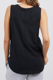A model wearing the Fundamental Scoop Tank in colour Black (Black), from the back