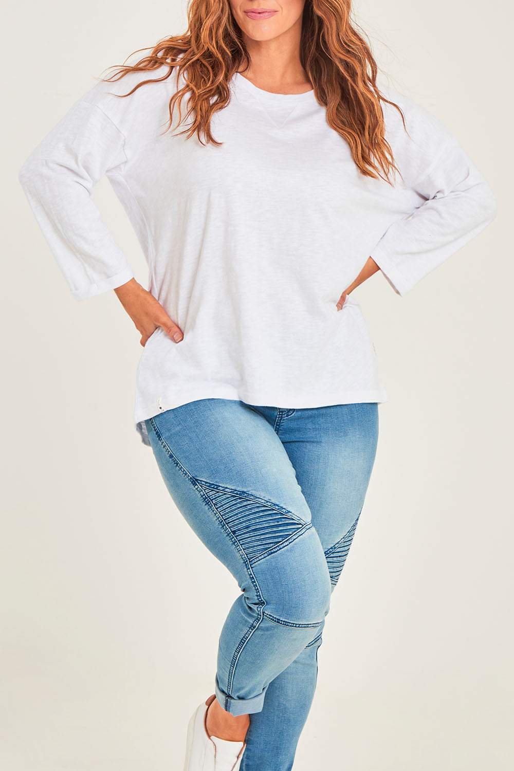 Model Laura wearing size 14 of the Fundamental Annie 3/4 Sleeve Tee in colour White (White), from the front, cropped image