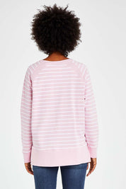 Model Olivia wearing size 10 of the Fundamental Sydney Crew in colour Pinkstripe (Pink), from the back