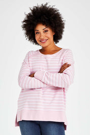 Model Olivia wearing size 10 of the Fundamental Sydney Crew in colour Pinkstripe (Pink), from the front, cropped image