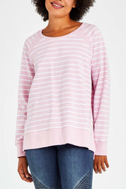 Model Olivia wearing size 10 of the Fundamental Sydney Crew in colour Pinkstripe (Pink), from the front, cropped image