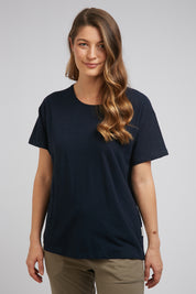 A model wearing the Fundamental Clover Tee in colour Navy (Blue), from the front, cropped image