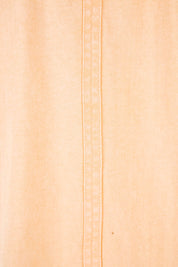 Product shot of the Fundamental Cloud Vee Tee in colour Papaya, detail
