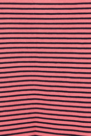 Product shot of the Fundamental Cotton Travel Skirt in colour Watermelon (Red), detail