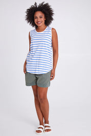 Model Olivia wearing size 10 of the Fundamental Scoop Tank in colour Cornflwhit (Blue), from the front, showing the whole outfit