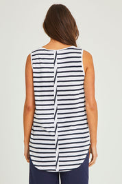Model Elhana wearing size 10 of the Fundamental Scoop Tank in colour Navywhit (Blue), from the back