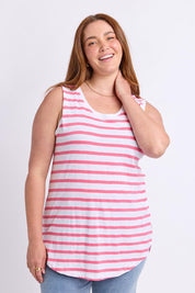 Model Genericm wearing size sample of the " Fundamental Scoop Tank" – Whitepink in colour Whitepink, in a cropped view