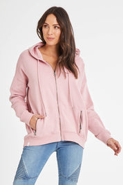 Model Madeline wearing size 10 of the Fundamentals Cosy Hoody in colour Dustypnk (Pink), from the front, cropped image