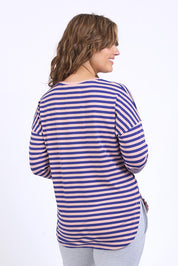 A model wearing the Fundamental Lauren Stripe LS Tee in colour Pinknavy (Pink), from the back