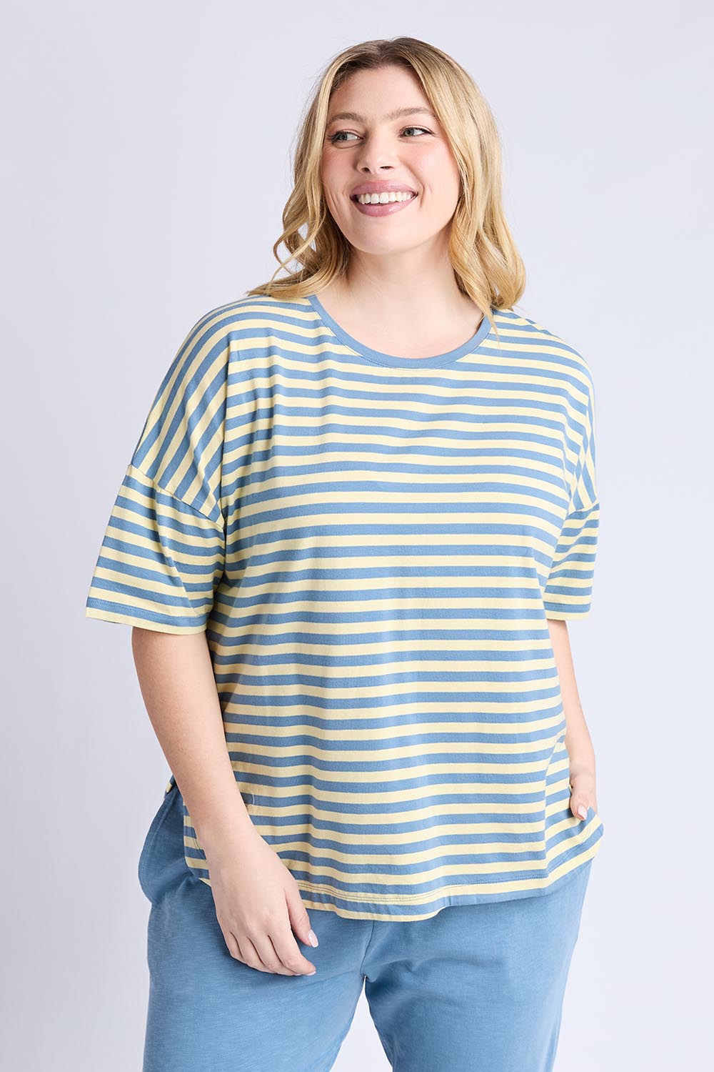 A model wearing the Fundamental Lauren S/S Cotton Stripe in colour Bluebanana (Blue), from the front, cropped image