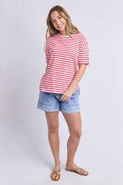A model wearing the Fundamental Lauren S/S Cotton Stripe in colour Cayannewht (Red), from the front, showing the whole outfit