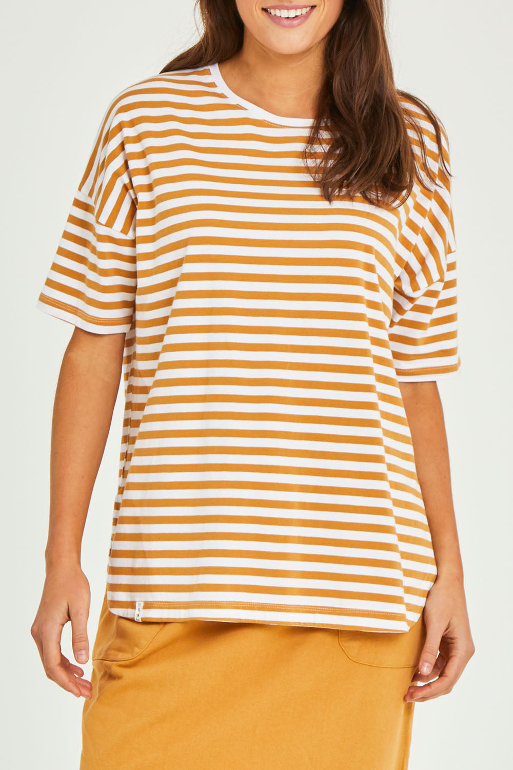 Model Elhana wearing size 10 of the Fundamental Lauren S/S Cotton Stripe in colour Honeywhit, from the front, cropped image