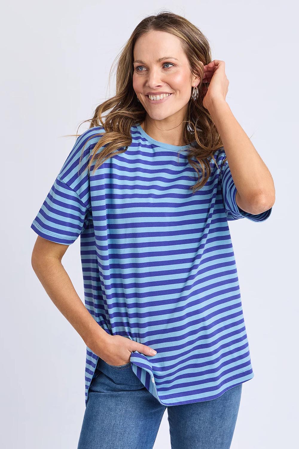 A model wearing the Fundamental Lauren S/S Cotton Stripe in colour Oceanblue (Blue), from the front, cropped image