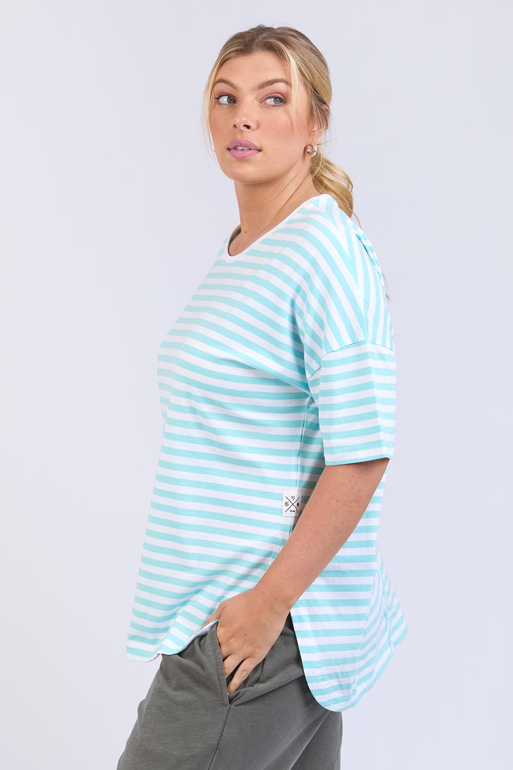 A model wearing the Fundamental Lauren S/S Cotton Stripe in colour Tonicblue (Blue), from the front, cropped image