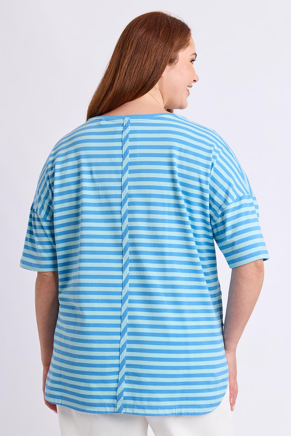 Model Genericm wearing size sample of the Fundamental Lauren Short Sleeve Cotton Stripe Tee - Tonicblueazure in colour Tonicblueazure, from an angle