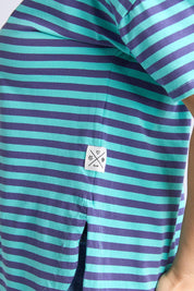 A model wearing the Fundamental Lauren S/S Cotton Stripe in colour Vbluepools (Blue), from the front, cropped image
