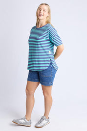 A model wearing the Fundamental Lauren S/S Cotton Stripe in colour Vbluepools (Blue), from the front, showing the whole outfit