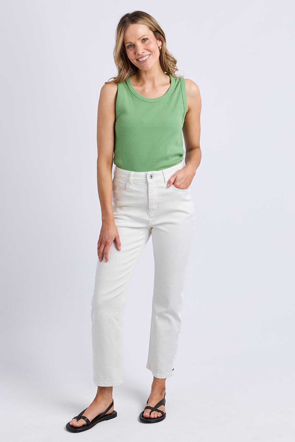 A model wearing the Fundamental Rib Crew Cotton Tank in colour Forest (Green), from the front, showing the whole outfit