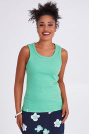 Model Olivia wearing size 10 of the Fundamental Rib Crew Cotton Tank in colour Meadow (Green), from the front, cropped image