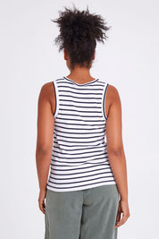 Model Olivia wearing size 10 of the Fundamental Indra Stripe Tank in colour Whitenavy (White), from the back