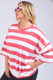 A model wearing the Fundamental Mazie Block Stripe Cotton Sweat in colour Watermelon (Red), from the front, cropped image