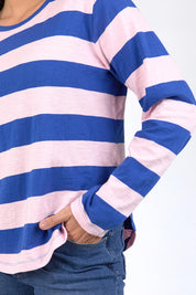 A model wearing the Fundamental Spritz Stripe Cotton Tee in colour Frenchblue (Blue), from the front, cropped image