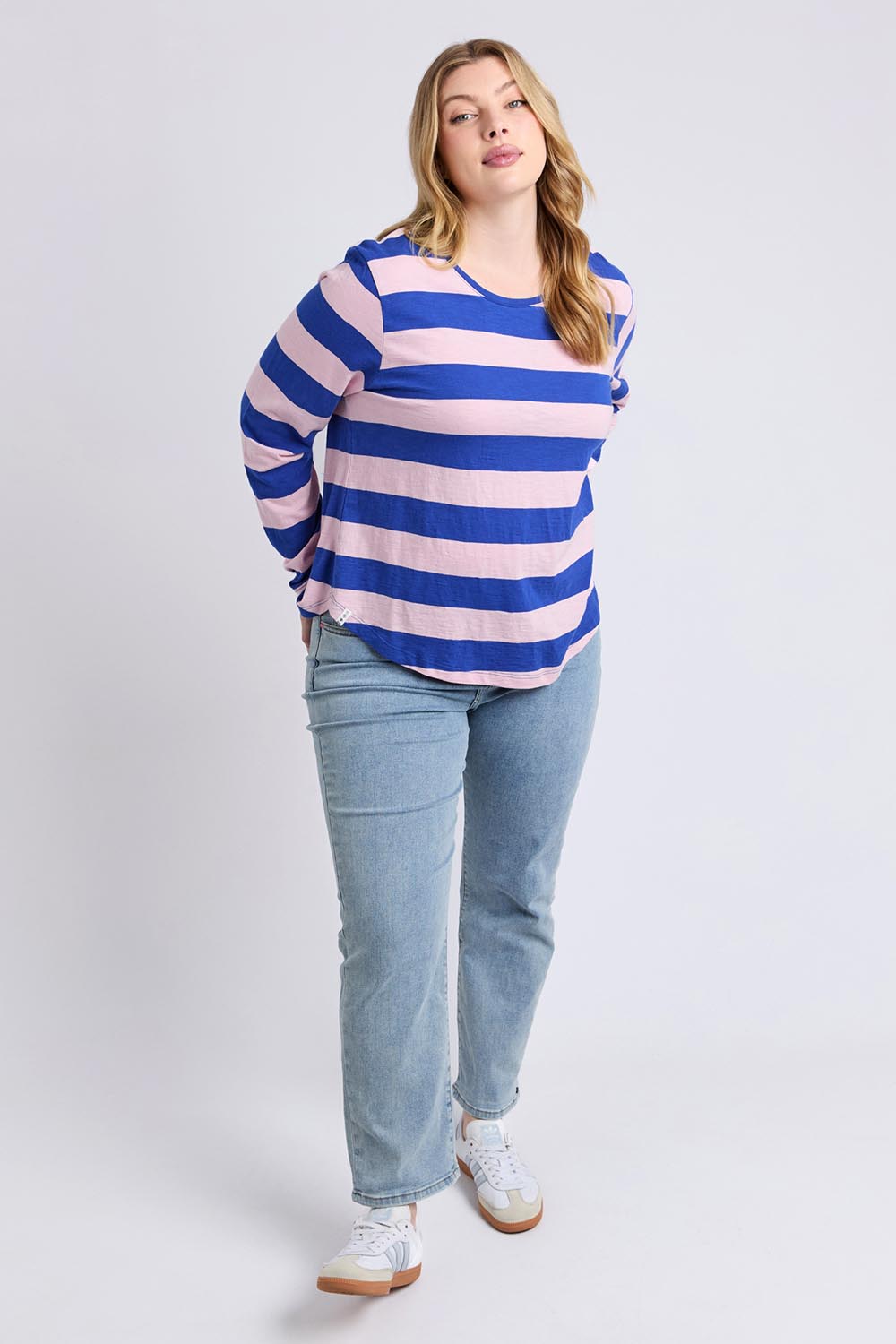 A model wearing the Fundamental Spritz Stripe Cotton Tee in colour Frenchblue (Blue), from the front, showing the whole outfit