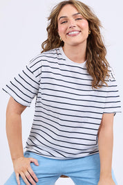 A model wearing the Fundamental Winona Stripe Cotton Tee in colour Whitenavy (White), from the front, cropped image