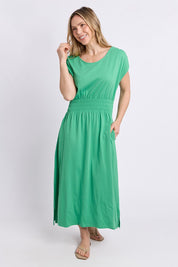 Model Genericm wearing size sample of the Fundamental Nelle Cotton Midi Dress – Greenbriar in colour Greenbriar, from the front