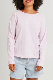 Model Olivia wearing size 10 of the Fundamental Chris Ls Sweat in colour Pinkaboo (Pink), from the front, cropped image