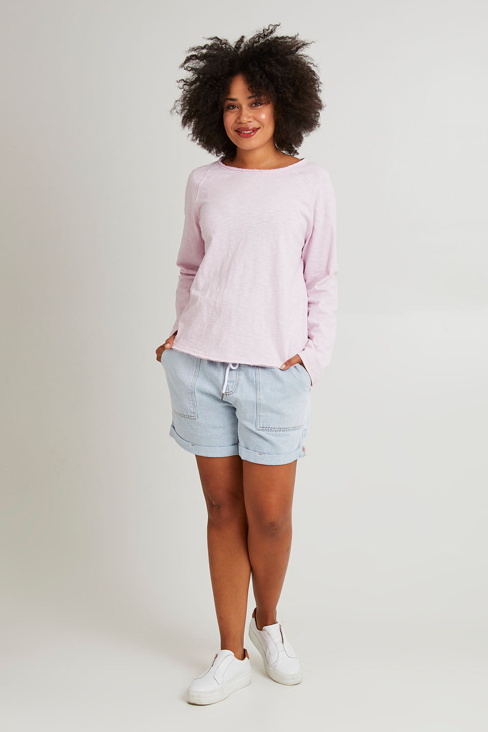 Model Olivia wearing size 10 of the Fundamental Chris Ls Sweat in colour Pinkaboo (Pink), from the front, showing the whole outfit