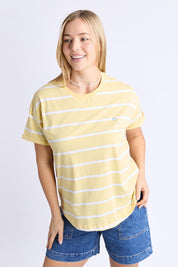 A model wearing the Fundamental Halli Cotton Short Sleeve Tee in colour Bananast, from the front, cropped image
