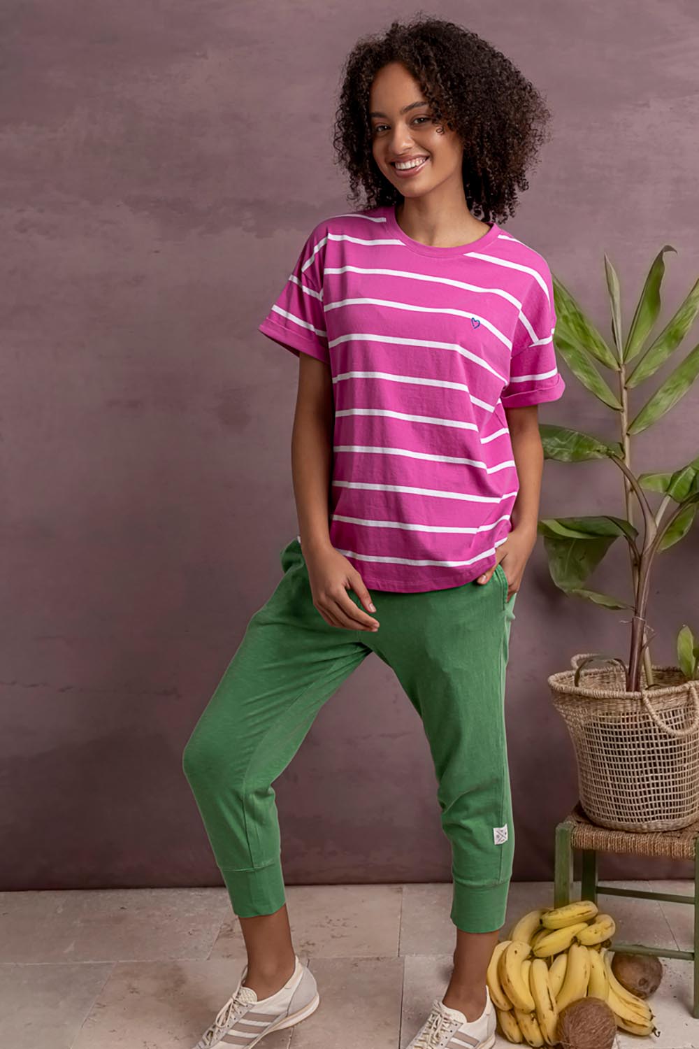 Model Genericm wearing size sample of the Fundamental Halli Cotton Short Sleeve Tee - Magentawht in colour Magentawht, from the front
