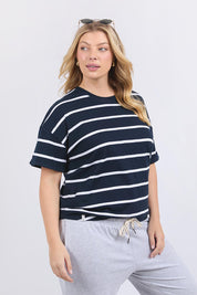 A model wearing the Fundamental Halli Cotton Short Sleeve Tee in colour Navyst (Blue), from the front, cropped image