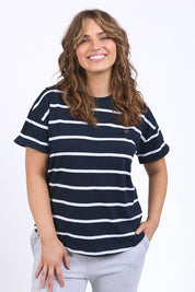 A model wearing the Fundamental Halli Cotton Short Sleeve Tee in colour Navyst (Blue), from the front, cropped image